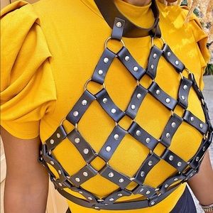 BRAND NEW.  STILL IN PACKAGE.  Thunderdome black leather vest.